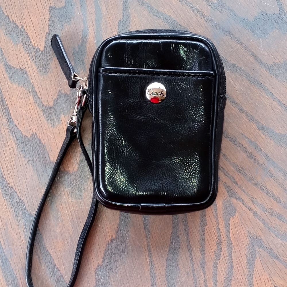 Coach Black Case with Silver Hardware.